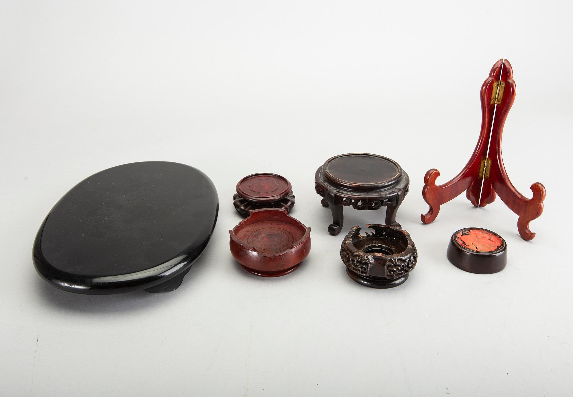 A set of 23 wooden stands, 20th century.