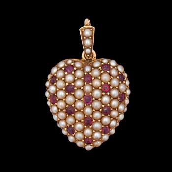 1129. A natural pearl and ruby pendant.