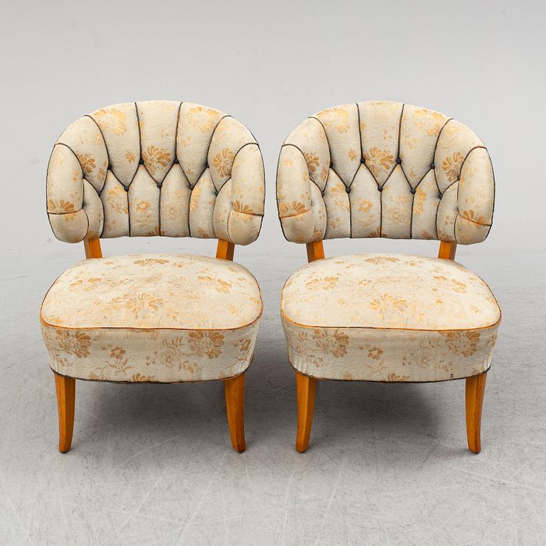 A pair of easy chairs 'Gamla Berlin' by Carl Malmsten.