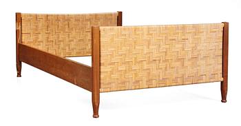 700. A Josef Frank mahogny bed, Firma Svenskt Tenn.