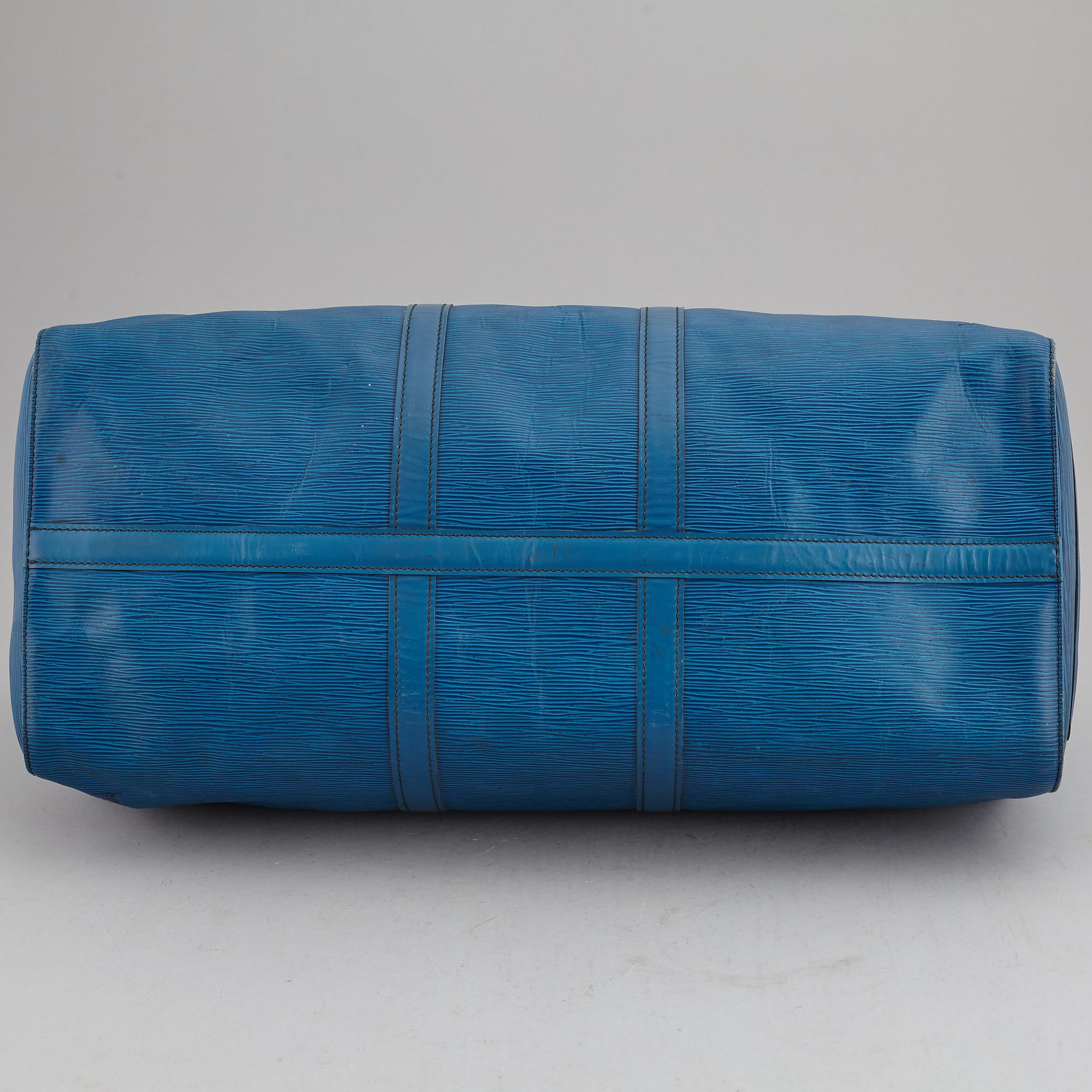 LOUIS VUITTON, a 'Keepall 55 Epi' weekendbag.