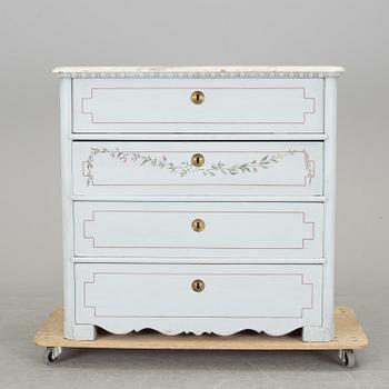 A mid 19th century chest of four drawers.