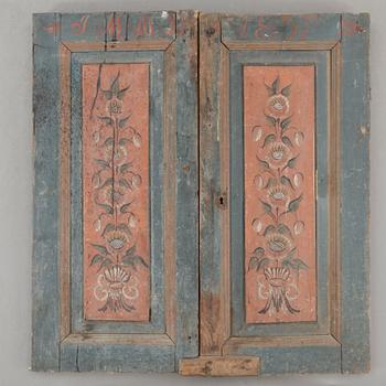 DÖRRAR, ett par, allmoge, Ljusdal, Hälsingland, bär datering 1857.