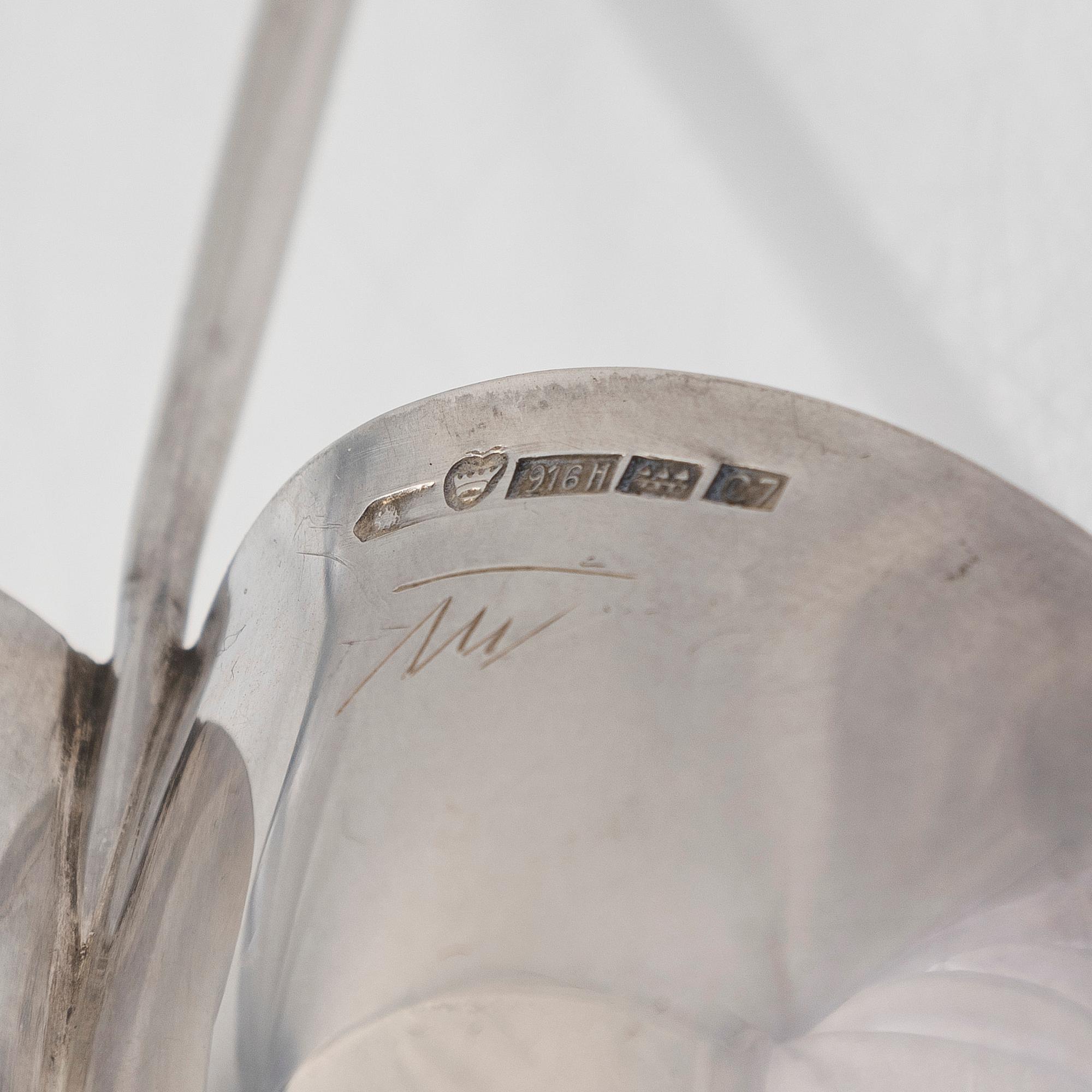 Tapio Wirkkala, a silver bowl and candlestick, Kultakeskus, Hämeenlinna 1956, and Hopeatehdas Helsinki 1952.