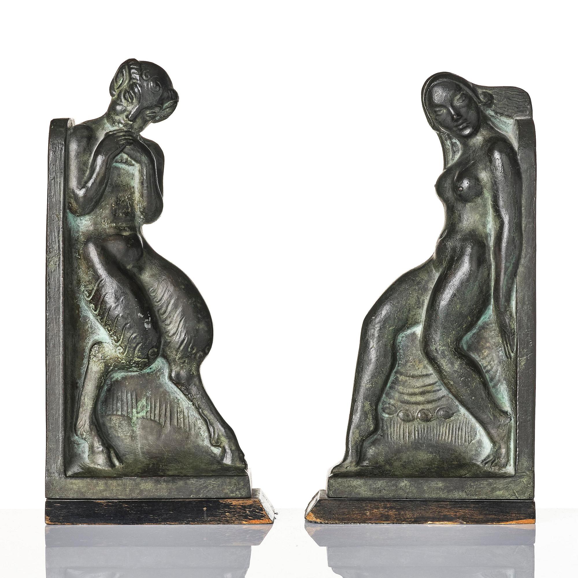 Axel Gute, a pair of Swedish Grace book ends, dated 1919.