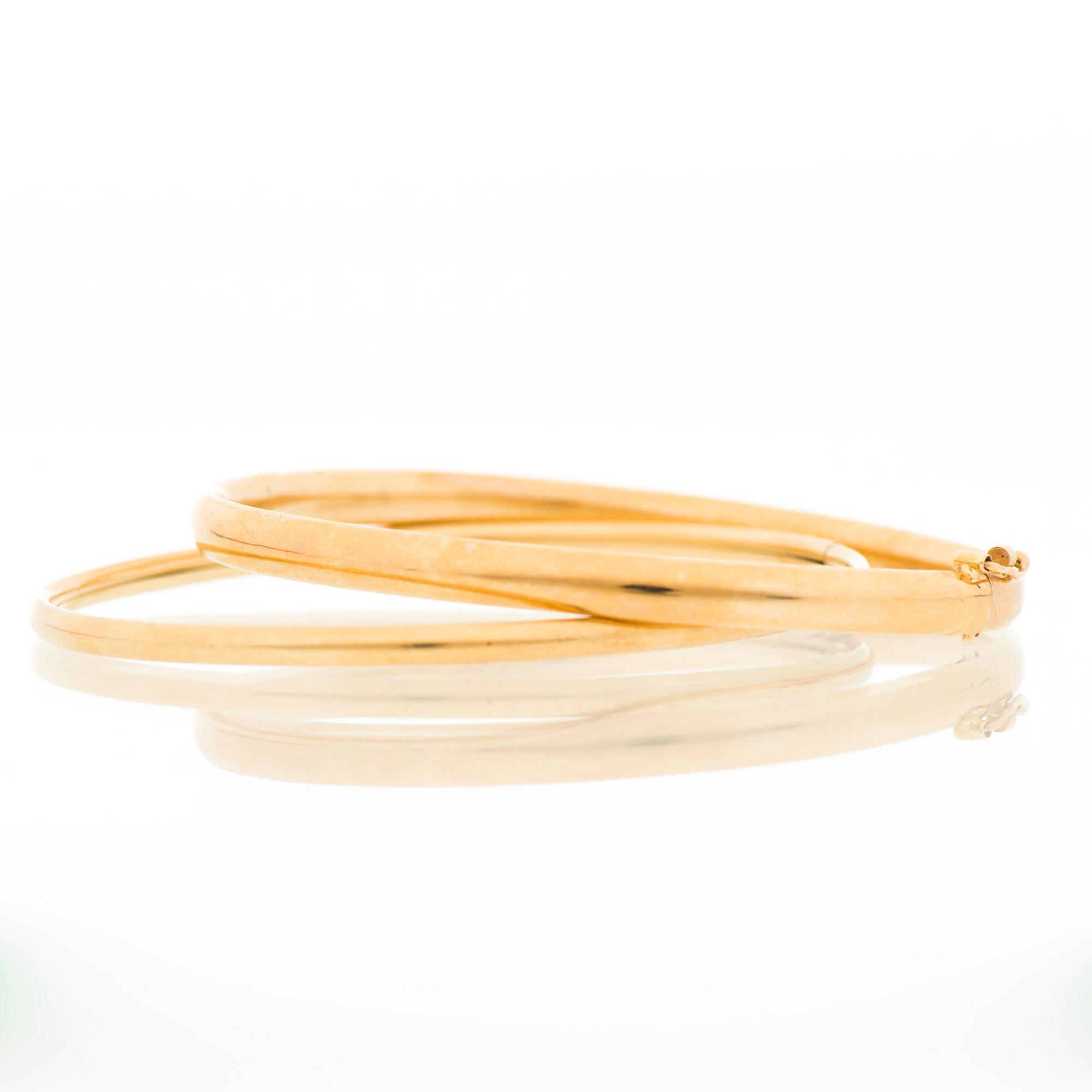 TWO BRACELETS, 14K gold.