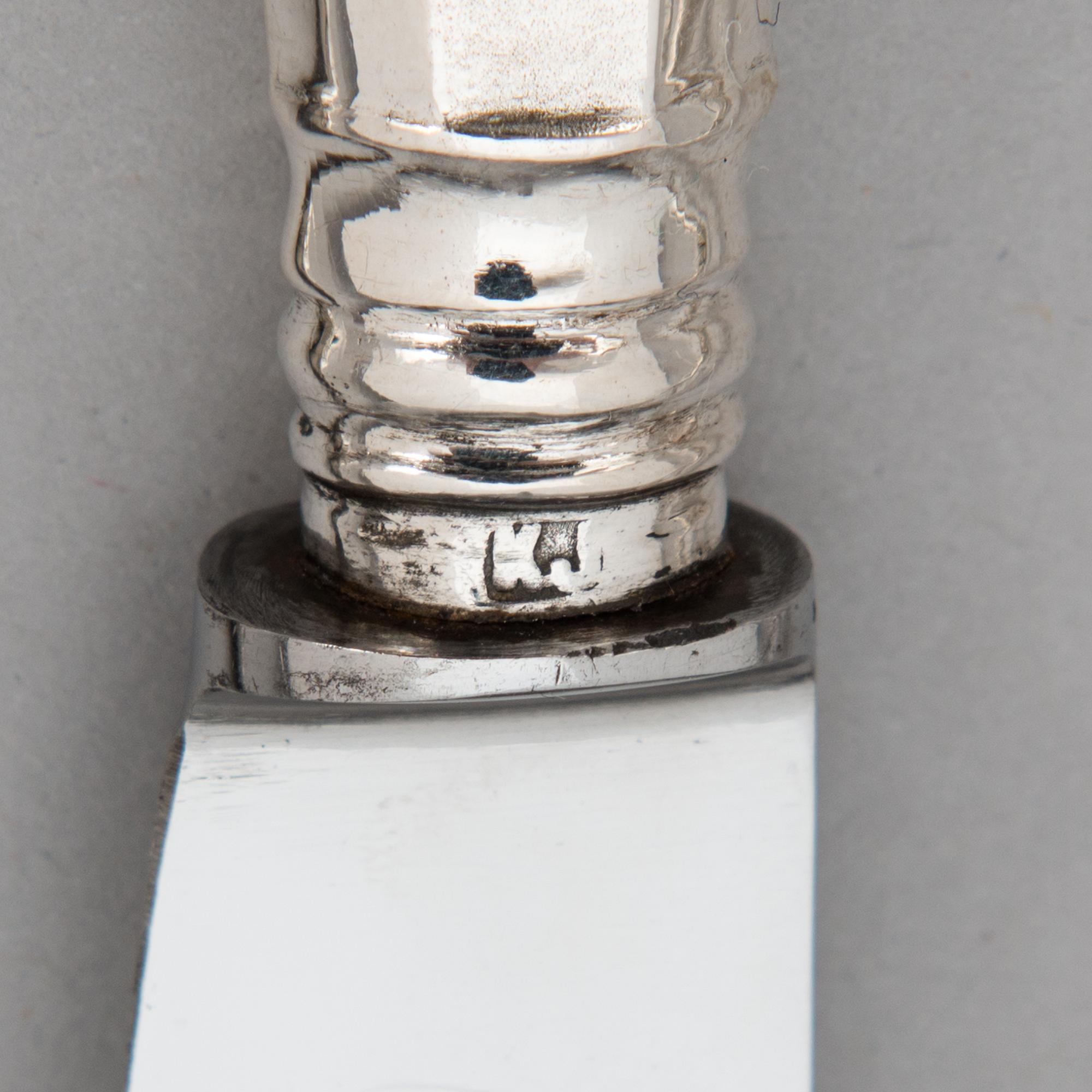 Bestick 12 st, silver, S:t Petersburg, mästarstämplar Morosov, Relander, Reijonen och Järveläinen. Ryssland 1845-1917.