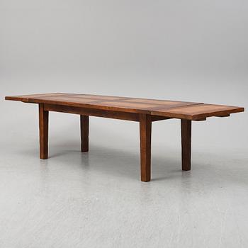 A French country style oak dining table, 1900/2000.