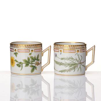 A set of 12 Royal Copenhagen 'Flora Danica' coffee cups with stands, Denmark, 20th Century.