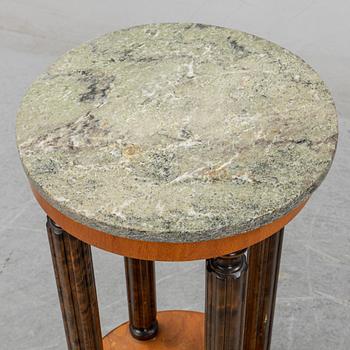 A stone top pedestal, 1920's/30's.