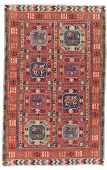 115. A CARPET, "Bäckahästen", a fine flat weave, 309 x 196,5 cm, signed MMF.