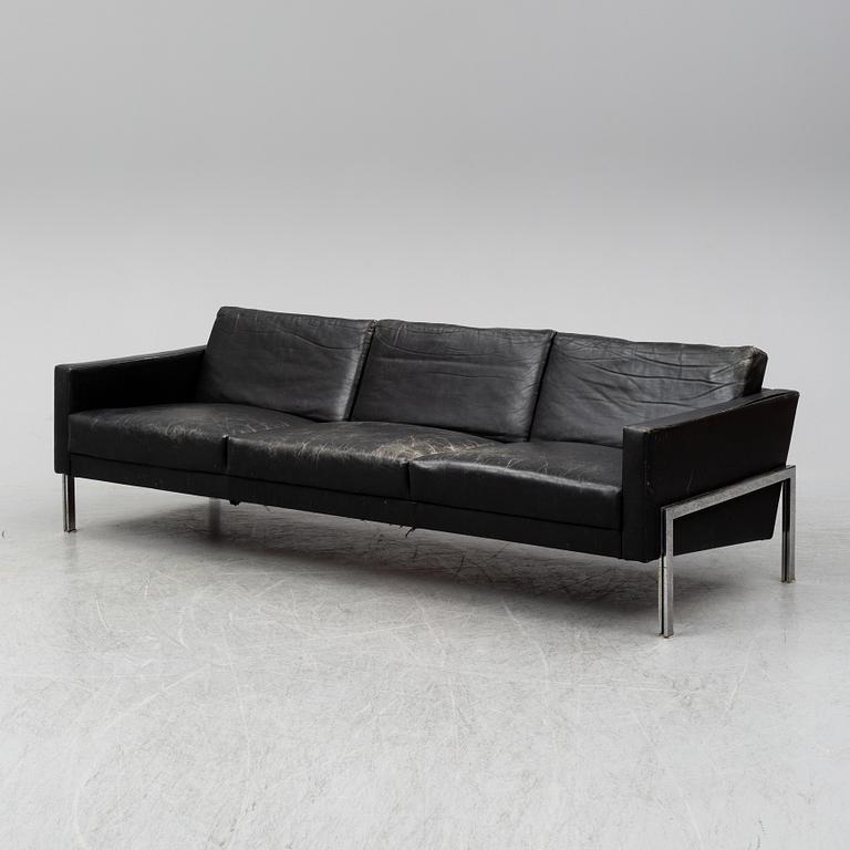A 1960's leather covered sofa.