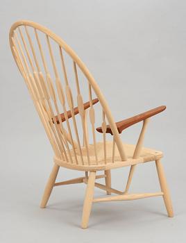 A Hans J Wegner ash and teak 'Peacock chair', by PP Møbler, Denmark.