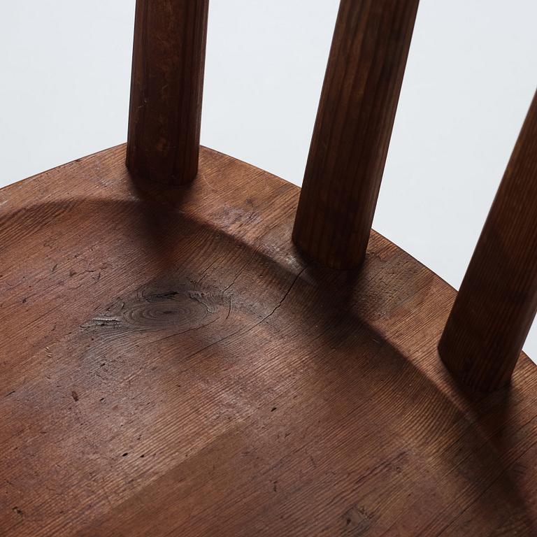 Axel Einar Hjorth, a pair of stained pine 'Utö' chairs, Nordiska Kompaniet, Sweden 1930s.