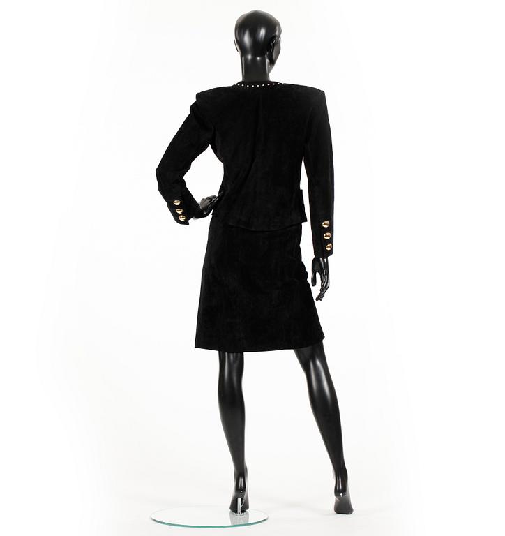 YVES SAINT LAURENT, a two-piece suit consisting of jacket and skirt.