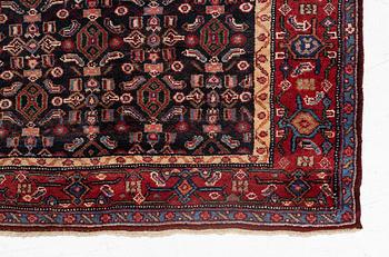 A semi-antique Bidjar rug, c. 255 x 135 cm.
