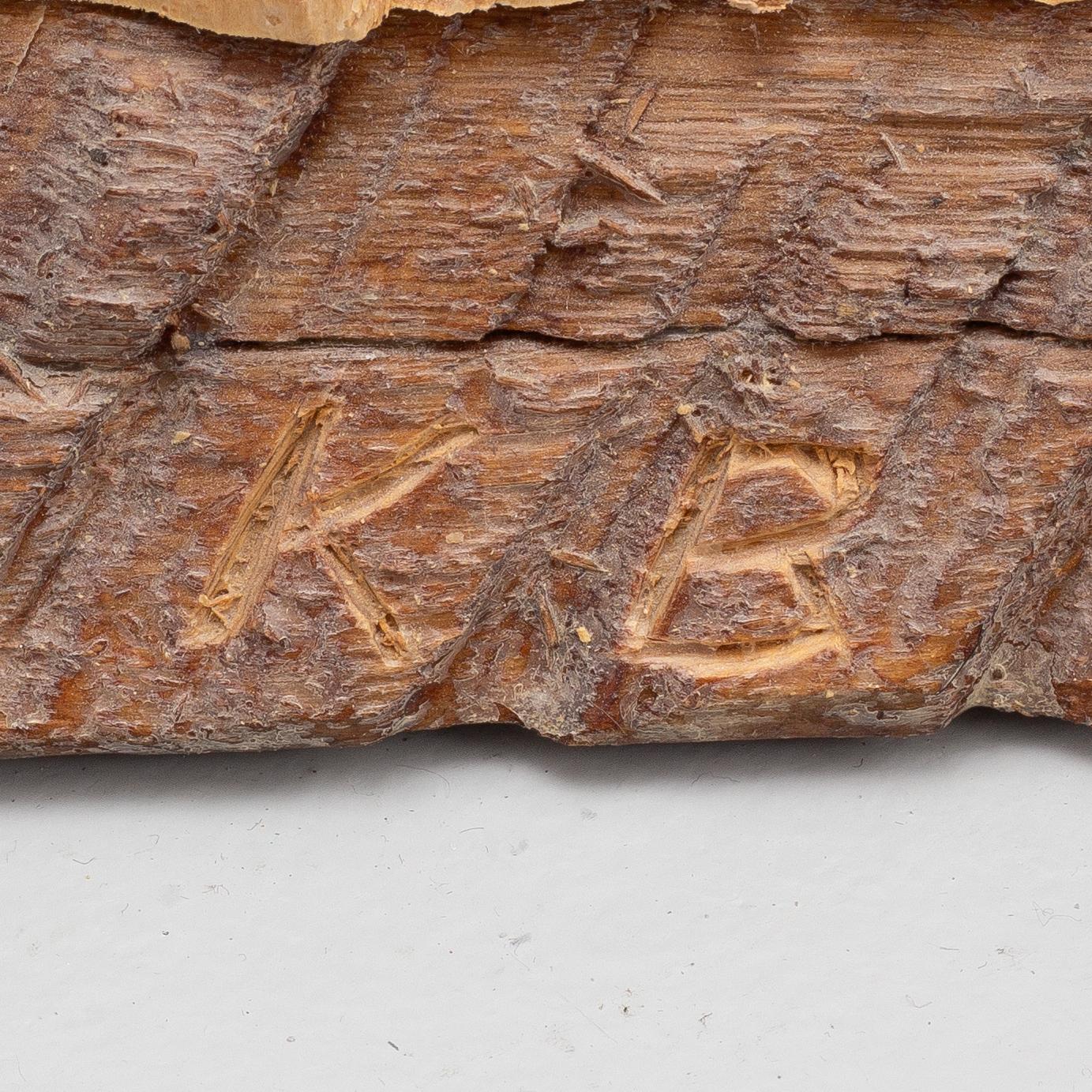 Kjell Bergqvist, a sculpture group, signed KB.