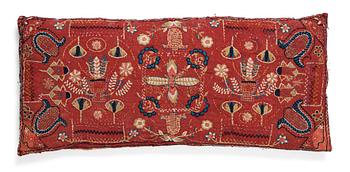 165. A CARRIAGE CUSHION, "Urnor och blommor", embroidered, ca 48 x 107 cm, Scania, Sweden 1830.
Filled.