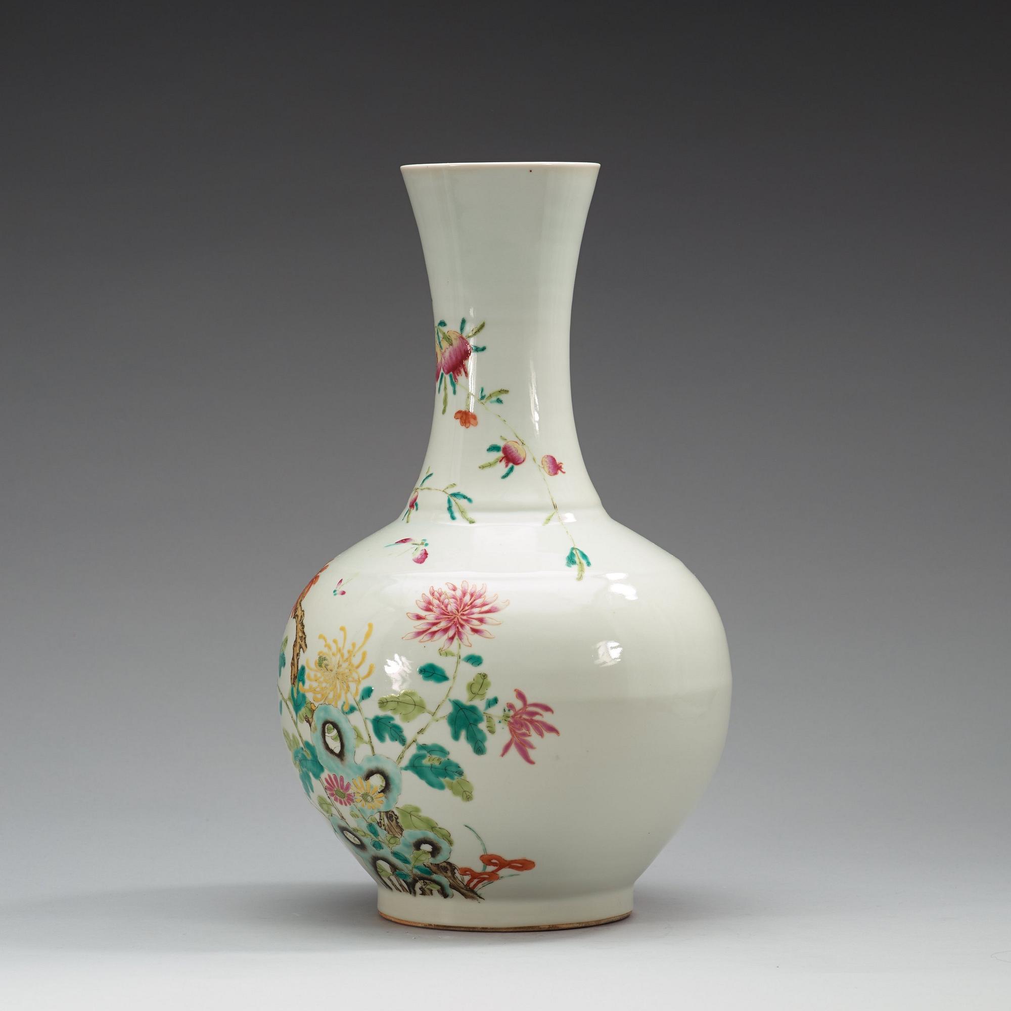 A famille rose vase, China, Republic, 20th Century, with Qianlong four character mark in red.