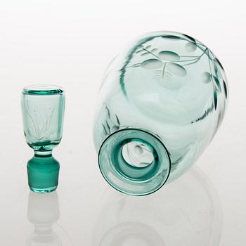 A set of five drinking glasses and a carafe from 1930s.