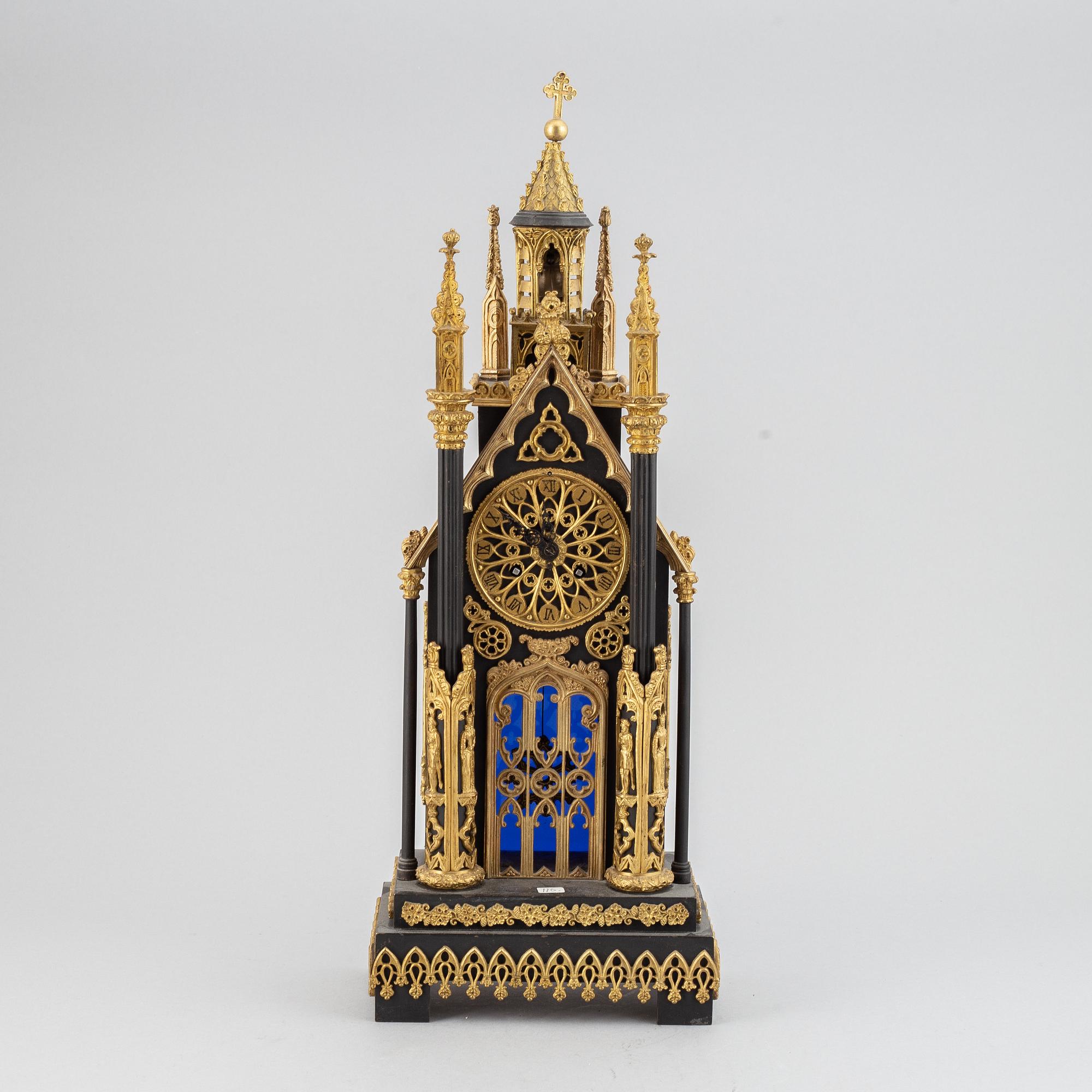 A gothic revival mantel clock.