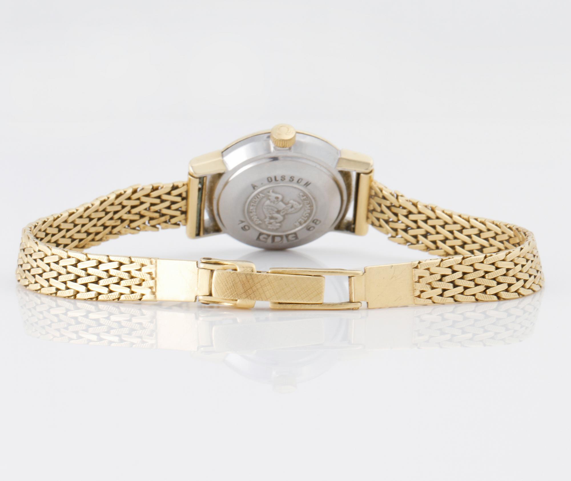 ARMBANDSUR, dam, armband i 18 K guld, Omega, Seamaster De Ville. Total vikt 29 g.