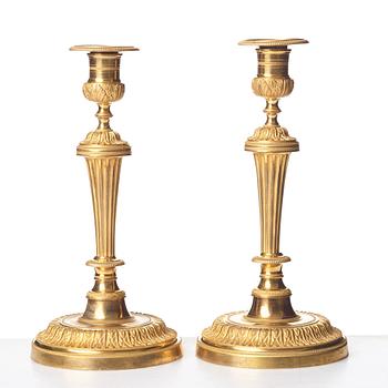 A pair of French Directoire candlesticks, ca 1790.