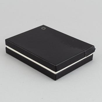 MOntblanc, a ball point pen and leather passport holder.