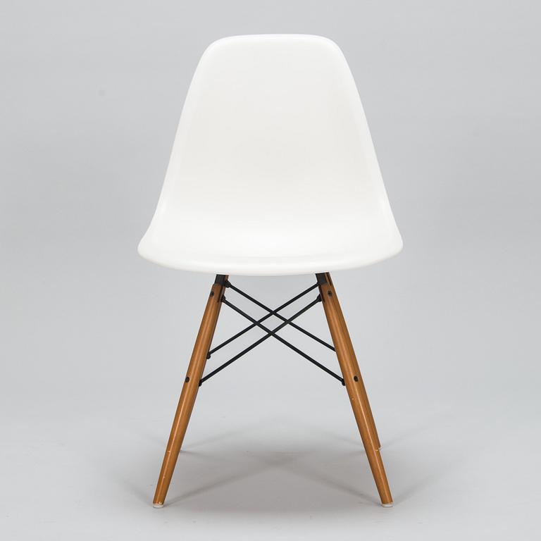 A 'Plastic chair DSW' by Charles and Ray Eames for Vitra.