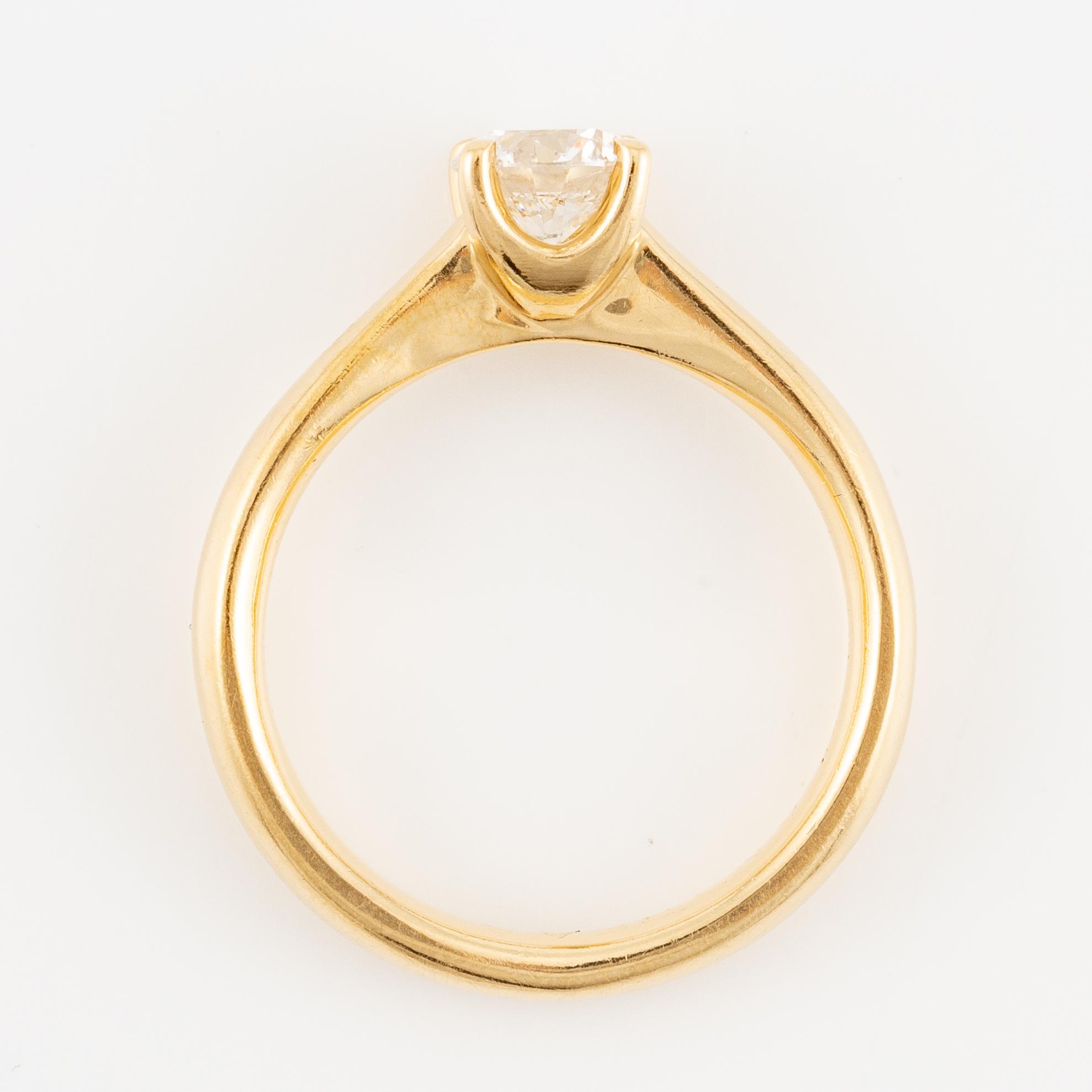 Ring 18K guld med briljantslipad diamant ca 0.97 ct.
