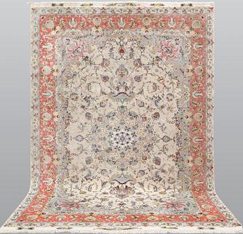 A part silk Tabriz carpet, so called 60 Raj, signed, c 290 x 176 cm.
