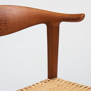 Hans J. Wegner, a teak, oak and cane "Cowhorn chair", JH 505, Johannes Hansen, Denmark 1950-60's.