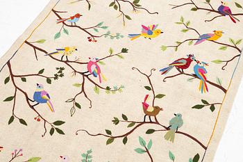 A hand-embroidered kelim rug, c. 183 x 125 cm.