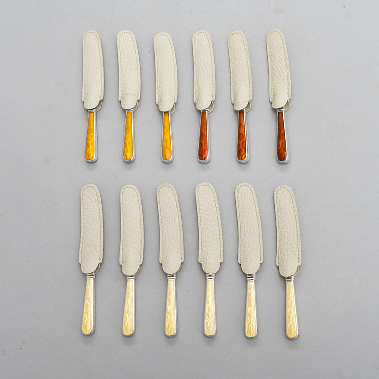 A set of twelve Tillander knives, enamel and silver (.916), Helsinki, Finland 1968. Danish steel blades.