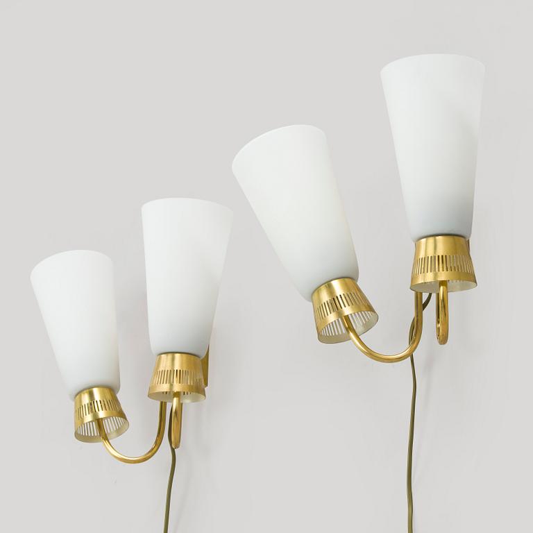 A pair of mid-20th century wall lights, model EY60, Itsu, Finland.