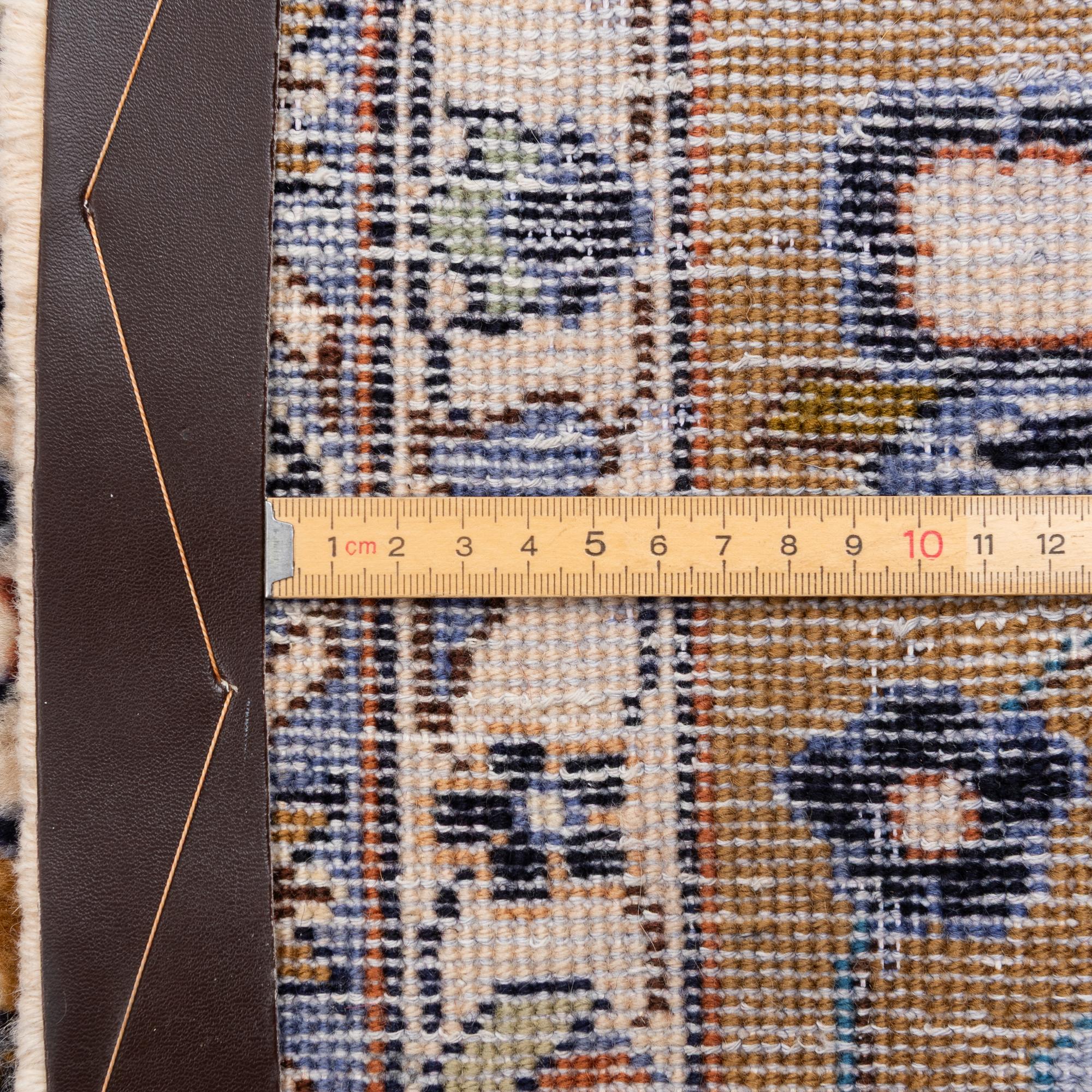 A Najafabad carpet, c. 350 x 237 cm.