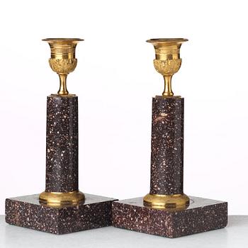 A pair of Swedish Empire candlesticks, early 19th century.