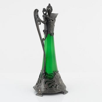 A silver plate and glass decanter, Art Nouveau, early 20th century.