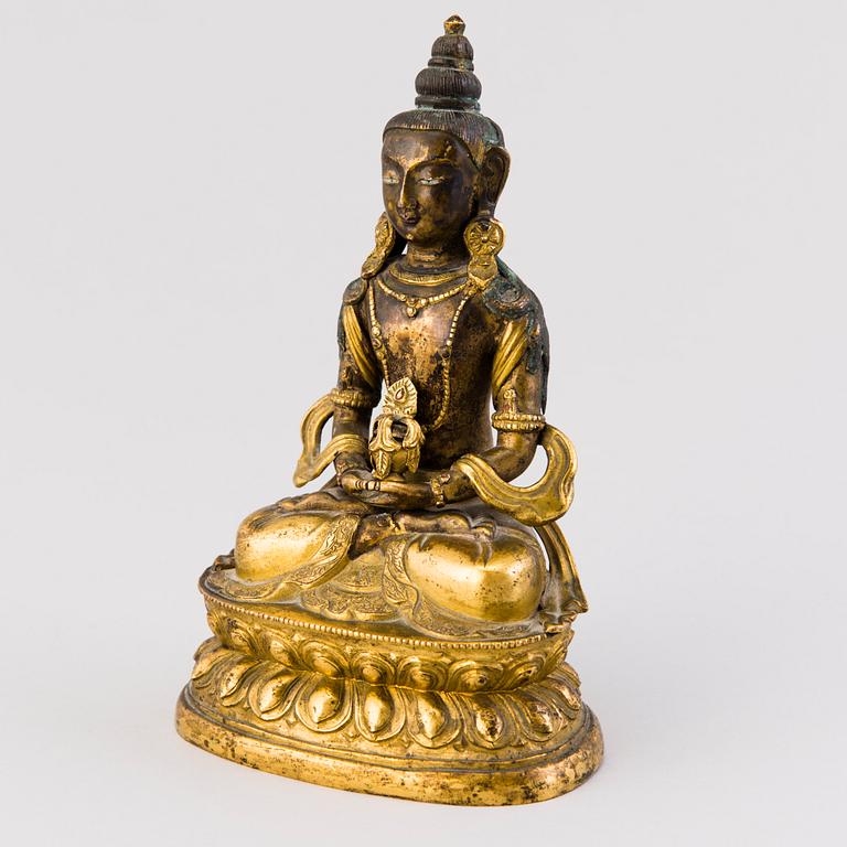 AMITABHA BUDDHA, polttokullattua kuparimetalliseosta, Tiibet, 1800-luvun alkupuoli.