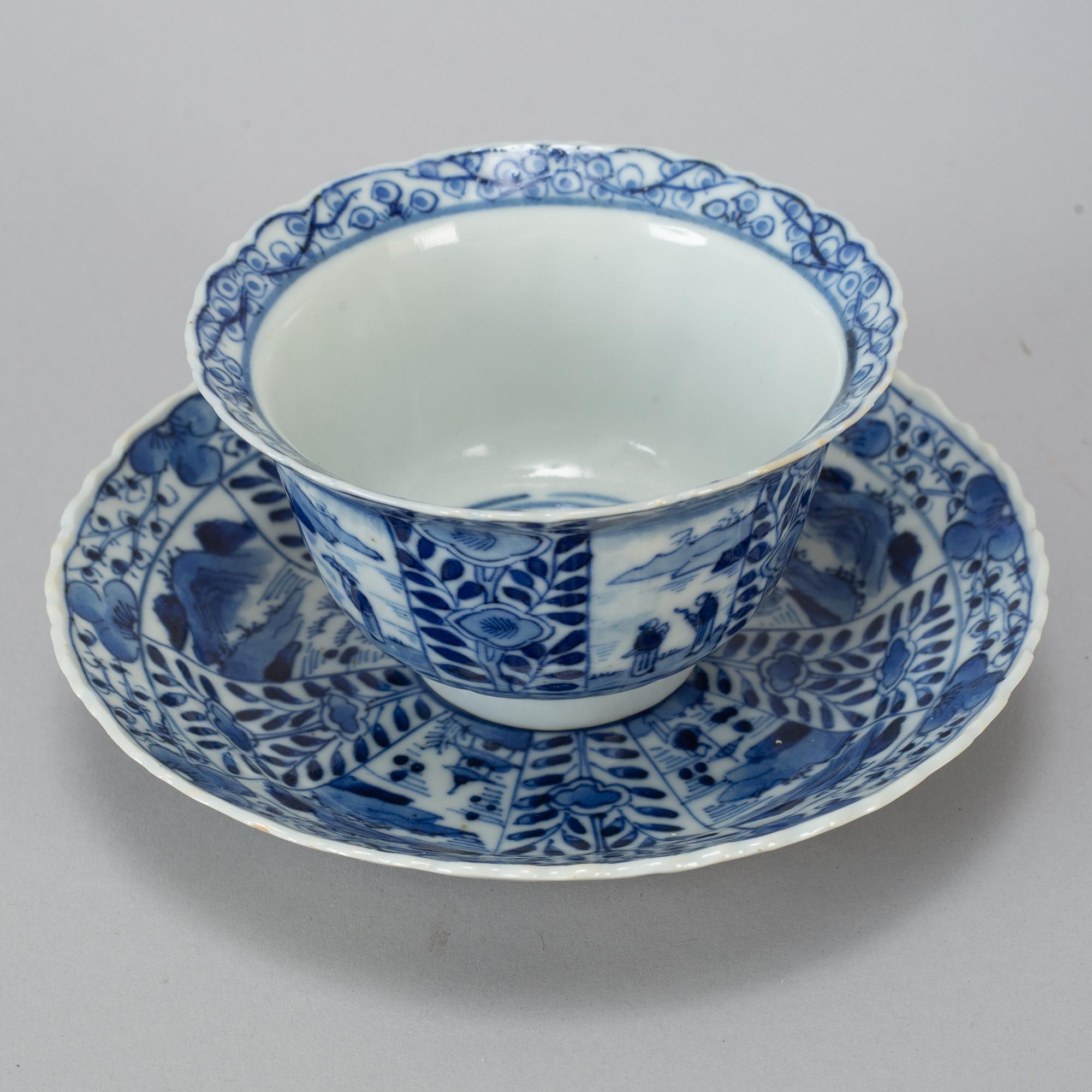Six Chinese blue and white cups with dishes, early 20th century.