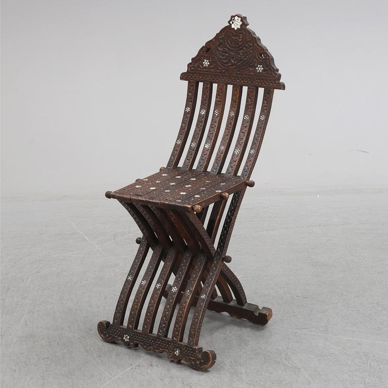 An early 20th century folding chair from the ottoman empire.