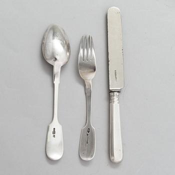 A Russian silver milk jug, and a silver fork, knife and spoon, Saint Petersburg 19th century.