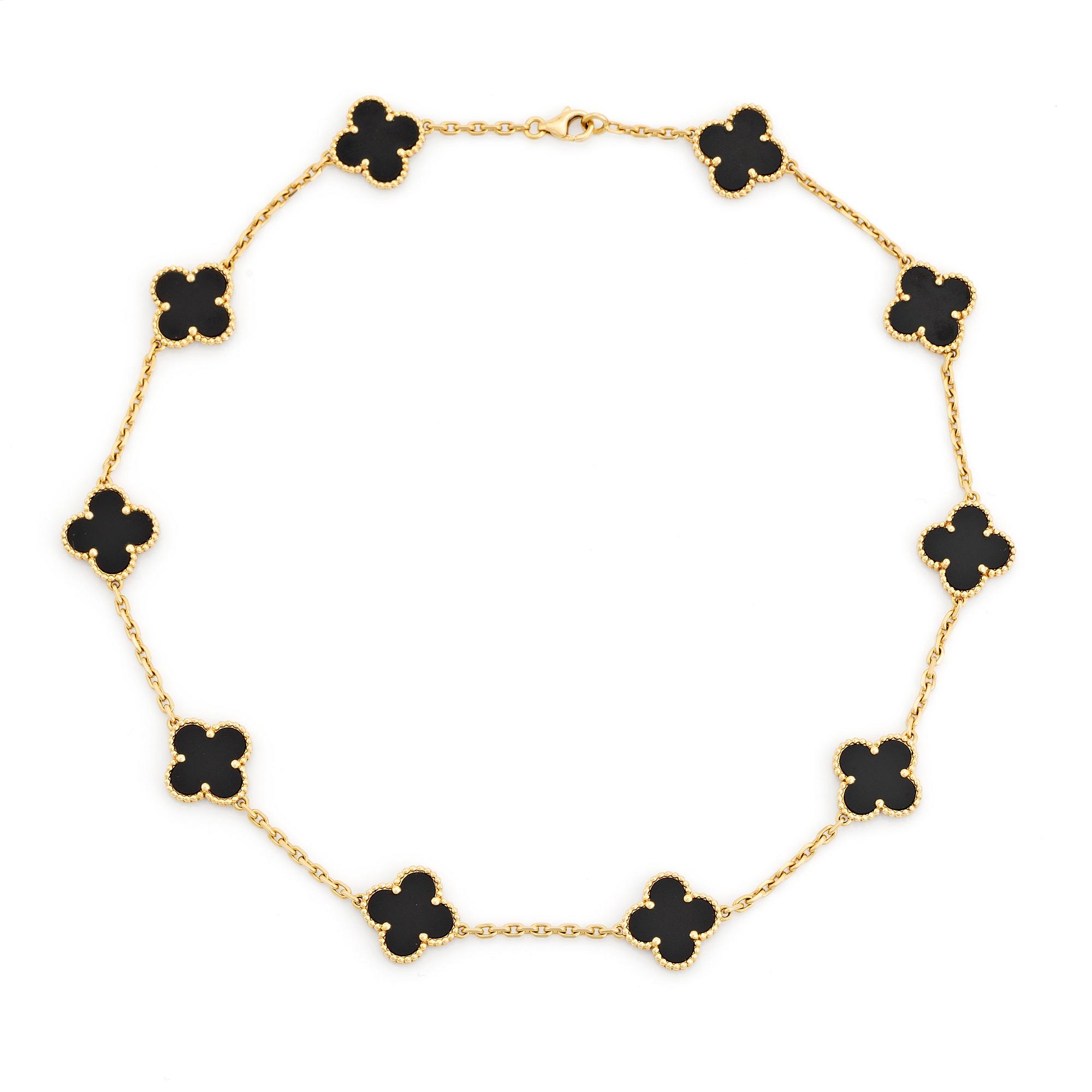 A Van Cleef & Arpels "Alhambra" necklace in 18K gold and onyx.