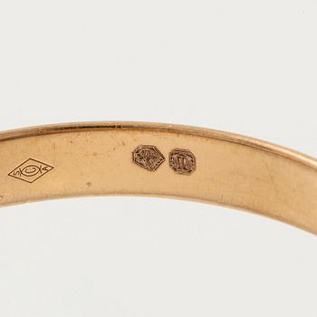 A Cartier "Trinity" ring 18K gold in three colours.