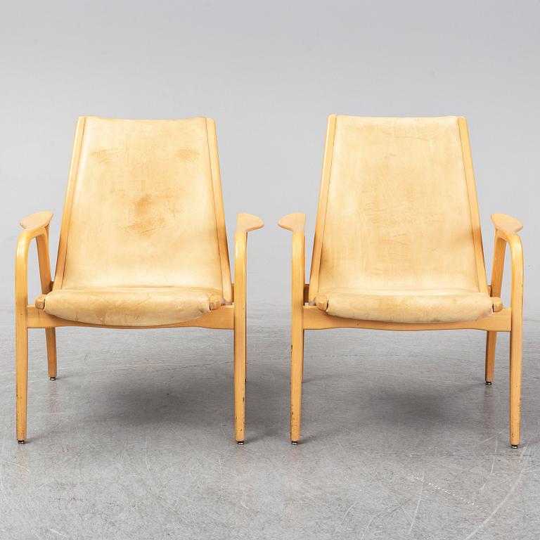 A pair of Laminett Yngve Ekström chairs.