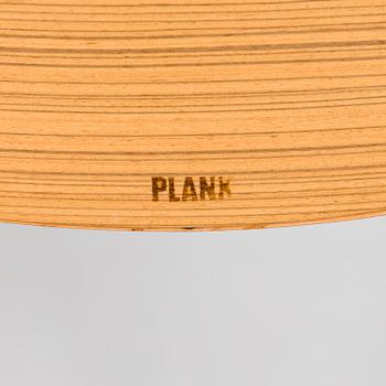 A pair of "Millefoglie" bar stools from Biagio Cisotti and Sandra Laube for Plank.