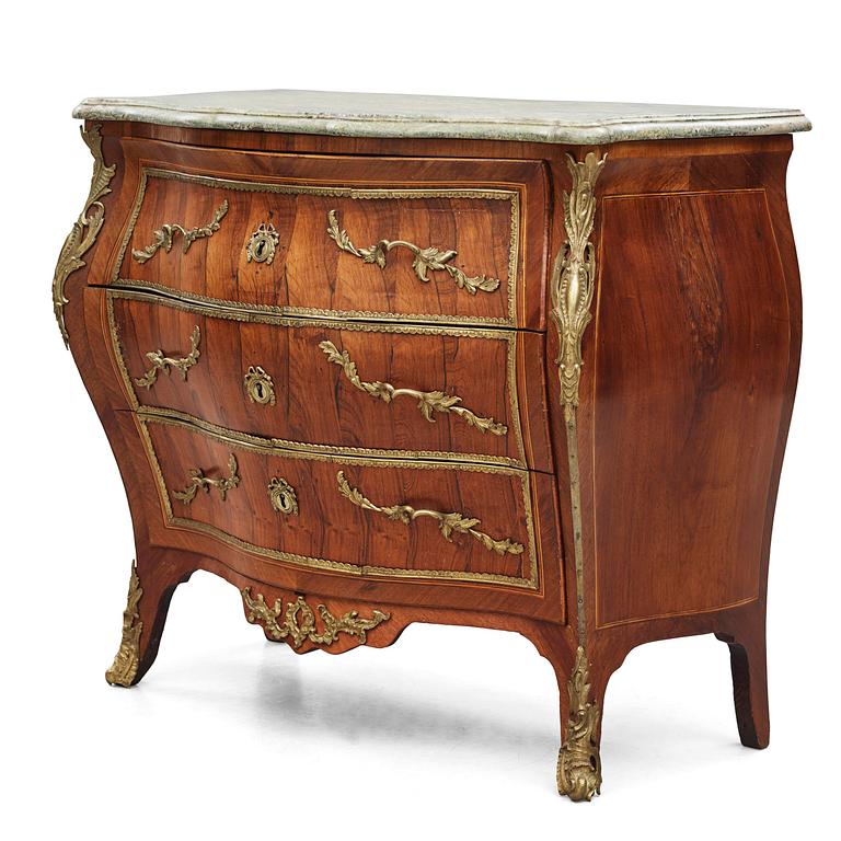 A Swedish rococo parquetry commode by L. Nordin (master in Stockholm 1743-73).