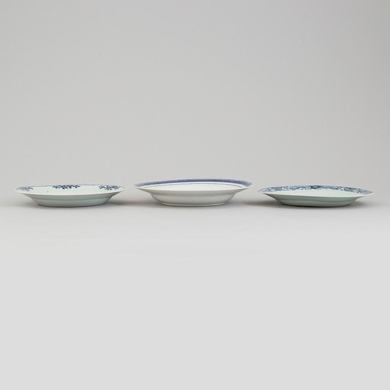 Two blue and white export porcelain plates and a soup plate, Qing dynasty, Qianlong (1736-95).