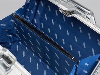 A set of three Rimowa bags later part of the 20th century.