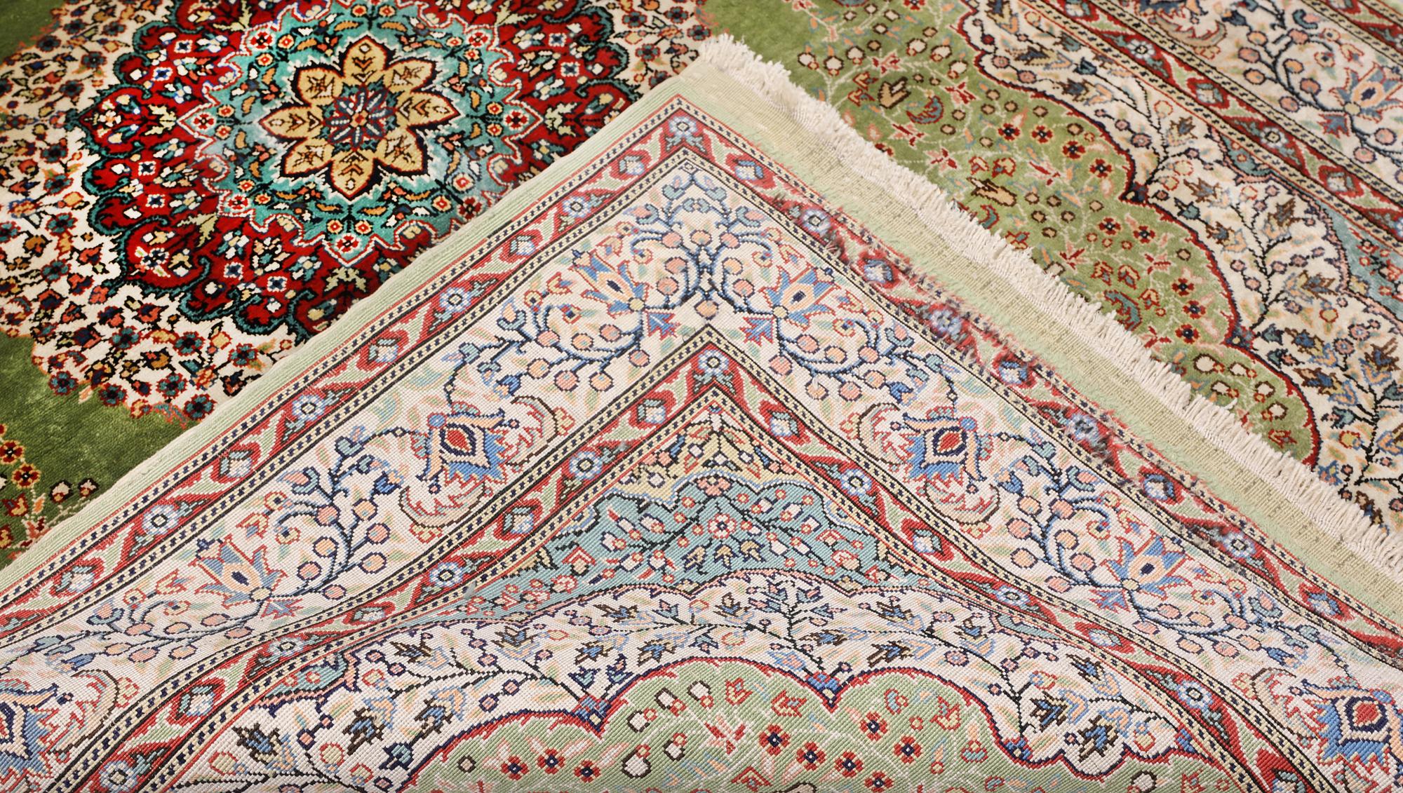 A semi-antique silk Kaysari rug, Turkey, 152 x 103 cm.